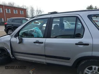 2002 Honda CR-V LX z VIN JHLRD78532C050707, wystawiony jako IAAI lot #41704967 z przebiegiem 306 564 mil mil oraz . Historia ofert i sprzedaży dostępna na DreamBid. Obrazek 15.