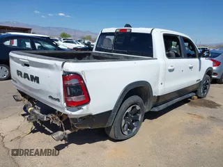 2022 Ram 1500 Rebel z VIN 1C6SRFLT4NN357352, wystawiony jako IAAI lot #41881613 z przebiegiem 31 285 mil mil oraz . Historia ofert i sprzedaży dostępna na DreamBid. Obrazek 4.