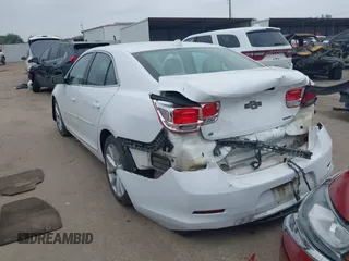 2014 Chevrolet Malibu LT with VIN 1G11E5SL5EF279016, listed as a IAAI auction lot 41910984 with 203,055 mi miles and . Bid and sale history available at DreamBid. Image 3.