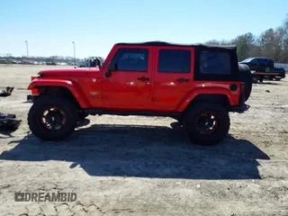 2015 Jeep Wrangler Unlimited Sahara with VIN 1C4BJWEG1FL748732, listed as a IAAI auction lot 41779308 with 109,986 mi miles. Bid and sale history available at carsss.com. Image 15.