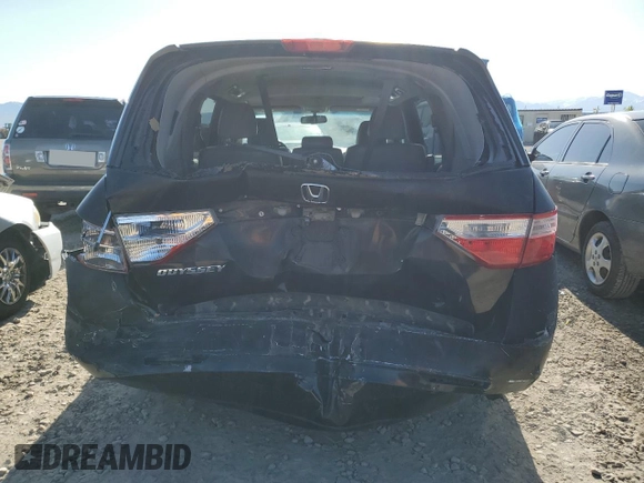 2012 Honda Odyssey EX-L with VIN 5FNRL5H69CB141594, listed as a Copart auction lot 55422115 with 181,745 mi miles and Salvage Title. Bid and sale history available at DreamBid. Image 6.