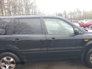 2006 Honda Pilot EX-L with VIN 5FNYF18776B021690, listed as a IAAI auction lot 42016219 with 239,666 mi miles and . Bid and sale history available at DreamBid. Image 13.