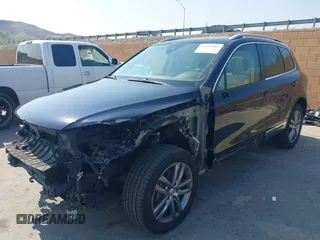 2016 Volkswagen Touareg Sport with VIN WVGEF9BP7GD010252, listed as a IAAI auction lot 42465165 with Not provided miles and . Bid and sale history available at DreamBid. Image 19.