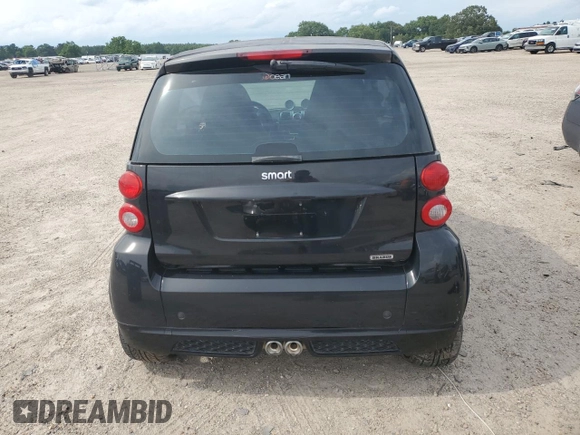 2009 Smart fortwo Pure z VIN WMEEJ31XX9K269982, wystawiony jako Copart lot #59214215 z przebiegiem 99 711 mil mil oraz Tytuł czysty. Historia ofert i sprzedaży dostępna na DreamBid. Obrazek 6.