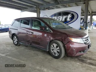 2014 Honda Odyssey EX-L with VIN 5FNRL5H66EB062435, listed as a Copart auction lot 53743445 with 103,849 mi miles and Salvage Title. Bid and sale history available at DreamBid. Image 4.