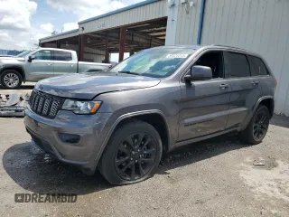 2018 Jeep Grand Cherokee Laredo E with VIN 1C4RJEAGXJC444211, listed as a Copart auction lot 58323315 with 55,914 mi miles and Salvage title. Bid and sale history available at DreamBid. Image 1.