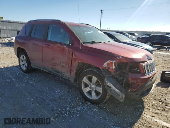 2016 Jeep Compass Sport with VIN 1C4NJDBB0GD753006, listed as a Copart auction lot 42496815 with 128,320 mi miles and Salvage Title. Bid and sale history available at carsss.com. Image 4.