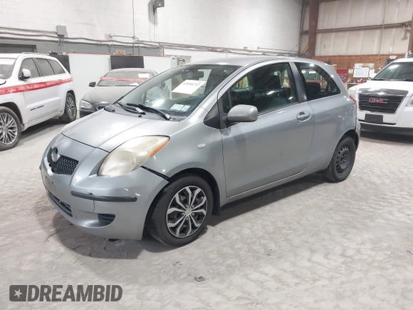 2008 Toyota Yaris with VIN JTDJT923085171725, listed as a IAAI auction lot 42090252 with 242,092 mi miles. Bid and sale history available at carsss.com. Image 2.