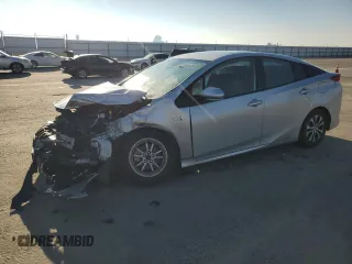 2020 Toyota Prius LE z VIN JTDKARFP7L3143612, wystawiony jako Copart lot #50036885 z przebiegiem 91 698 mil mil oraz Szkoda całkowita • Salvage title. Historia ofert i sprzedaży dostępna na DreamBid. Obrazek 1.