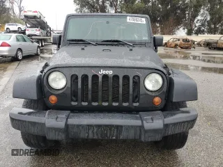 2009 Jeep Wrangler Unlimited X with VIN 1J4GA39119L755818, listed as a Copart auction lot 47886245 with 187,972 mi miles and Salvage Title. Bid and sale history available at carsss.com. Image 5.