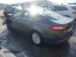 2015 Ford Fusion S Hybrid with VIN 3FA6P0UU9FR283189, listed as a IAAI auction lot 41632307 with 152,653 mi miles. Bid and sale history available at carsss.com. Image 3.