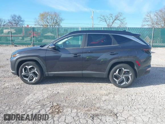 2022 Hyundai Tucson SEL z VIN 5NMJCCAE6NH064395, wystawiony jako IAAI lot #41874438 z przebiegiem 30 798 mil mil oraz . Historia ofert i sprzedaży dostępna na DreamBid. Obrazek 14.