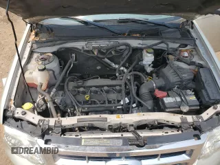 2011 Ford Escape XLS with VIN 1FMCU0C75BKC58172, listed as a Copart auction lot 60492825 with 114,518 mi miles and Salvage title. Bid and sale history available at DreamBid. Image 11.