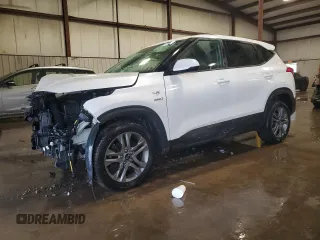 2021 Kia Seltos LX with VIN KNDEPCAA2M7137948, listed as a Copart auction lot 55986505 with 48,867 mi miles and Salvage title. Bid and sale history available at DreamBid. Image 1.