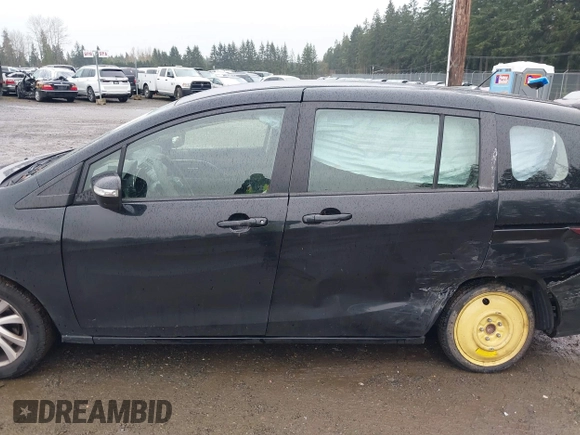 2013 Mazda 5 Sport with VIN JM1CW2BL3D0149779, listed as a IAAI auction lot 41868728 with 110,912 mi miles. Bid and sale history available at carsss.com. Image 14.