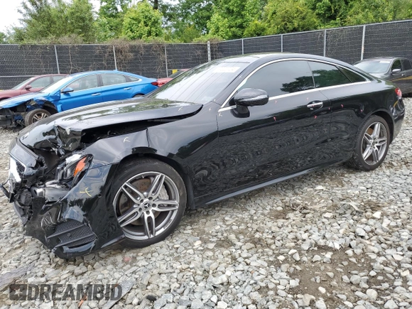 2019 Mercedes-Benz E-Class E 450 with VIN WDD1J6JB7KF102986, listed as a Copart auction lot 57220704 with 66,159 mi miles and Salvage Title. Bid and sale history available at carsss.com. Image 1.