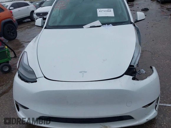2023 Tesla Model Y Performance with VIN 7SAYGDEF7PF807312, listed as a IAAI auction lot 41711068 with 25,029 mi miles and . Bid and sale history available at DreamBid. Image 10.