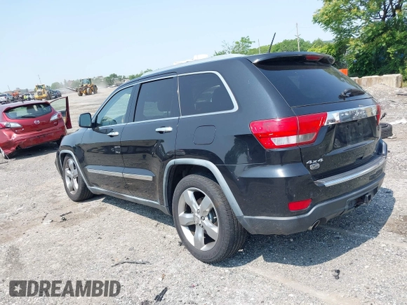 2011 Jeep Grand Cherokee Overland with VIN 1J4RR6GT3BC574037, listed as a IAAI auction lot 42411532 with 158,765 mi miles and . Bid and sale history available at DreamBid. Image 3.