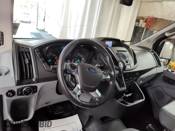 2016 Ford Transit z VIN 1FTYR2XM0GKA06408, wystawiony jako IAAI lot #42818715 z przebiegiem 170 021 mil mil oraz . Historia ofert i sprzedaży dostępna na DreamBid. Obrazek 7.