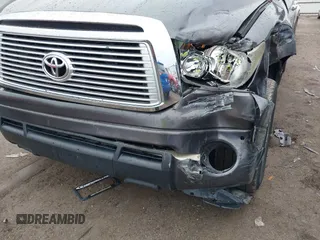 2012 Toyota Tundra 4WD Truck LTD with VIN 5TFHW5F17CX211075, listed as a IAAI auction lot 41510976 with 204,930 mi miles. Bid and sale history available at carsss.com. Image 18.