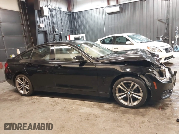 2018 BMW 4 Series 430i xDrive with VIN WBA4J3C56JBL03844, listed as a IAAI auction lot 40864200 with 56,115 mi miles and . Bid and sale history available at DreamBid. Image 14.