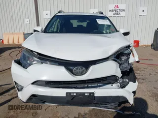 2017 Toyota RAV4 XLE with VIN JTMWFREV9HJ128521, listed as a IAAI auction lot 41658054 with 106,788 mi miles and . Bid and sale history available at DreamBid. Image 12.