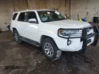 2018 Toyota 4Runner SR5 with VIN JTEBU5JR1J5589454, listed as a IAAI auction lot 41482351 with 238,432 mi miles. Bid and sale history available at carsss.com. Image 1.