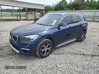 2018 BMW X1 xDrive28i z VIN WBXHT3C31J5L28228, wystawiony jako Copart lot #56987505 z przebiegiem 163 858 mil mil oraz Czysty tytuł • Clean title. Historia ofert i sprzedaży dostępna na DreamBid. Obrazek 1.