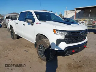 2024 Chevrolet Silverado 1500 LT Trail Boss with VIN 3GCUDFED4RG431888, listed as a IAAI auction lot 41694858 with 4,406 mi miles and . Bid and sale history available at DreamBid. Image 1.