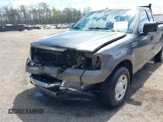 2004 Ford F-150 XL with VIN 1FTRF12W14NB89702, listed as a IAAI auction lot 42049938 with 106,379 mi miles. Bid and sale history available at carsss.com. Image 6.