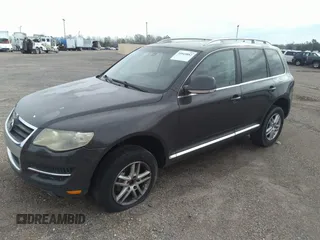 2008 Volkswagen Touareg V6 with VIN WVGBE77L98D044999, listed as a IAAI auction lot 35943882 with 179,515 mi miles and . Bid and sale history available at DreamBid. Image 2.