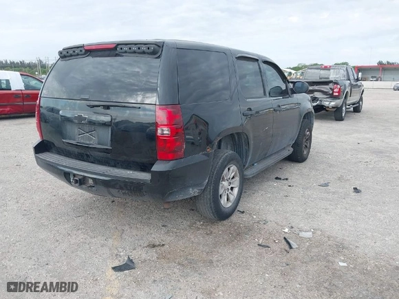 2010 Chevrolet Tahoe LS with VIN 1GNUKAE06AR252687, listed as a IAAI auction lot 41818559 with 158,877 mi miles. Bid and sale history available at carsss.com. Image 4.