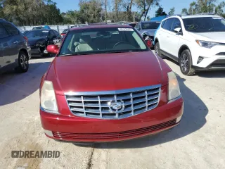 2007 Cadillac DTS V8 z VIN 1G6KD57Y67U181293, wystawiony jako Copart lot #48122555 z przebiegiem 137 962 mil mil oraz Szkody całkowita. Historia ofert i sprzedaży dostępna na DreamBid. Obrazek 5.