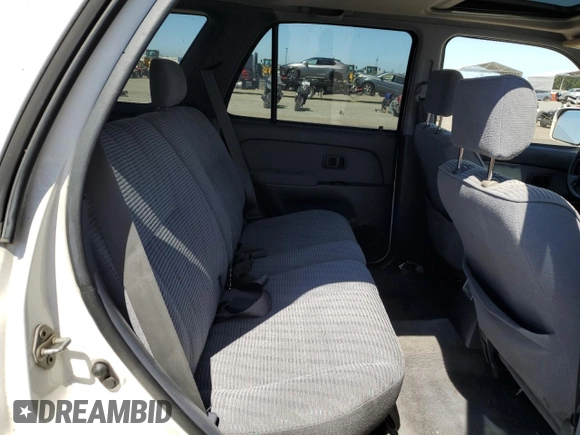 1998 Toyota 4Runner SR5 z VIN JT3GN86R6W0058695, wystawiony jako Copart lot #56430765 z przebiegiem 310 244 mil mil oraz Czysty tytuł • Clean title. Historia ofert i sprzedaży dostępna na DreamBid. Obrazek 10.