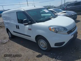 2022 Ram ProMaster City Cargo Tradesman z VIN ZFBHRFAB0N6Y29931, wystawiony jako IAAI lot #42483604 z przebiegiem 57 742 mil mil oraz . Historia ofert i sprzedaży dostępna na DreamBid. Obrazek 1.