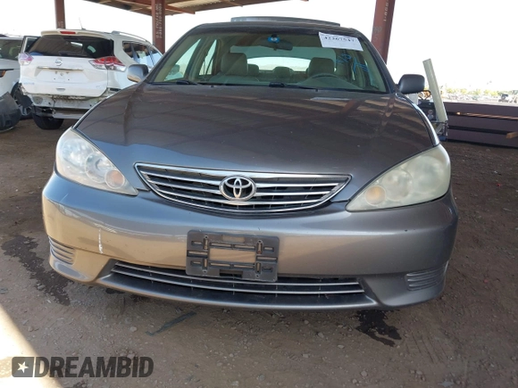 2006 Toyota Camry LE z VIN 4T1BF32K86U635925, wystawiony jako IAAI lot #42267547 z przebiegiem 162 593 mil mil oraz . Historia ofert i sprzedaży dostępna na DreamBid. Obrazek 12.