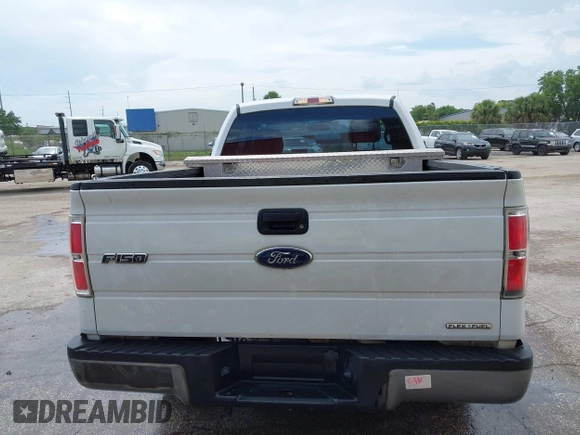 2013 Ford F-150 XL with VIN 1FTMF1CM9DFC13973, listed as a IAAI auction lot 42326721 with 209,911 mi miles and . Bid and sale history available at DreamBid. Image 8.