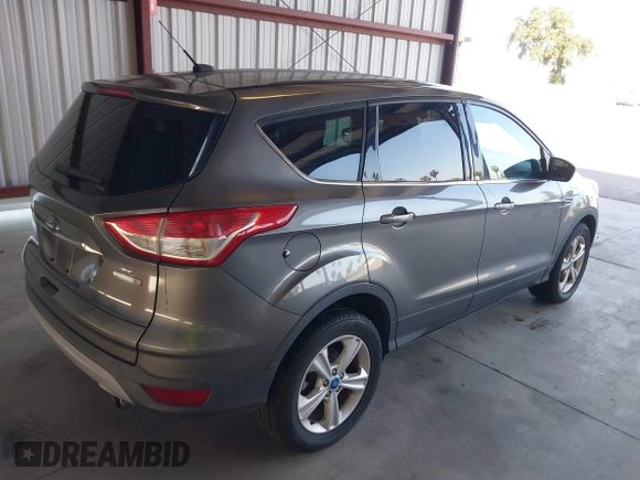 2013 Ford Escape SE with VIN 1FMCU0GX6DUC25019, listed as a IAAI auction lot 42165049 with 90,774 mi miles. Bid and sale history available at carsss.com. Image 4.