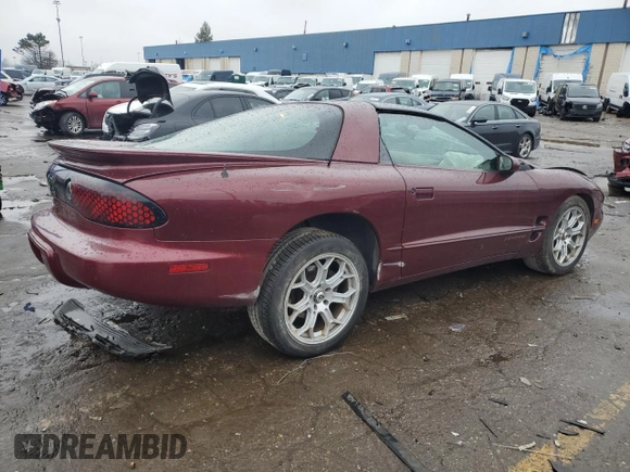 2001 Pontiac Firebird Firebird z VIN 2G2FS22K112122739, wystawiony jako Copart lot #86128074 z przebiegiem 271 969 mil mil oraz Czysty tytuł • Clean title. Historia ofert i sprzedaży dostępna na DreamBid. Obrazek 3.