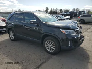 2015 Kia Sorento LX with VIN 5XYKT4A69FG657456, listed as a Copart auction lot 51454525 with 147,528 mi miles and Salvage Title. Bid and sale history available at DreamBid. Image 4.