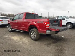 2018 Ford F-150 XL with VIN 1FTFX1E51JKF98962, listed as a IAAI auction lot 41827587 with 128,031 mi miles and . Bid and sale history available at DreamBid. Image 3.