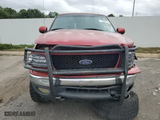 2001 Ford F-150 SuperCrew XLT with VIN 1FTRW08W01KE02928, listed as a Copart auction lot 73629704 with 313,859 mi miles and Salvage Title. Bid and sale history available at carsss.com. Image 5.