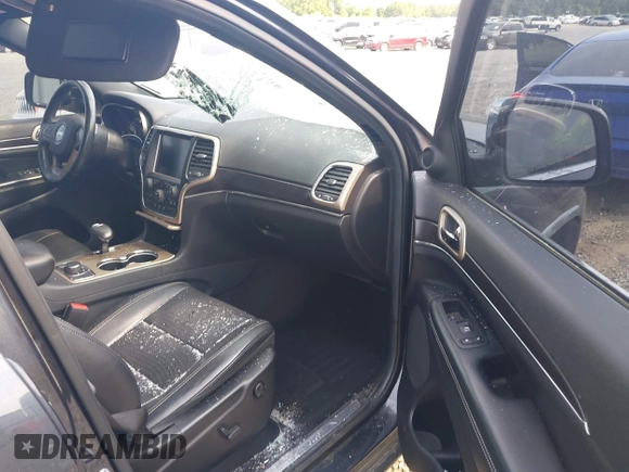 2014 Jeep Grand Cherokee Limited with VIN 1C4RJFBM2EC443232, listed as a IAAI auction lot 42303008 with 152,956 mi miles and . Bid and sale history available at DreamBid. Image 5.