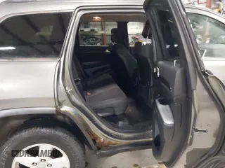 2011 Jeep Grand Cherokee Laredo with VIN 1J4RR4GG3BC623048, listed as a IAAI auction lot 42163452 with 192,241 mi miles and . Bid and sale history available at DreamBid. Image 8.