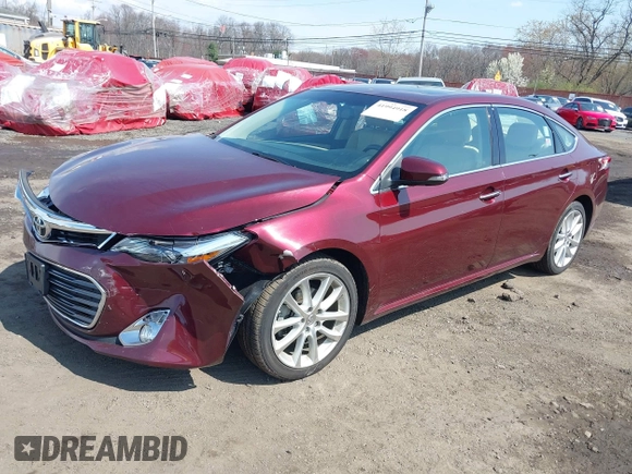 2014 Toyota Avalon Limited with VIN 4T1BK1EB1EU134577, listed as a IAAI auction lot 41994918 with 74,570 mi miles. Bid and sale history available at carsss.com. Image 2.