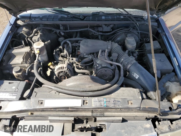 2003 GMC Jimmy z VIN 1GKCT18X43K110056, wystawiony jako Copart lot #48671585 z przebiegiem 272 867 mil mil oraz Czysty tytuł • Clean title. Historia ofert i sprzedaży dostępna na DreamBid. Obrazek 12.