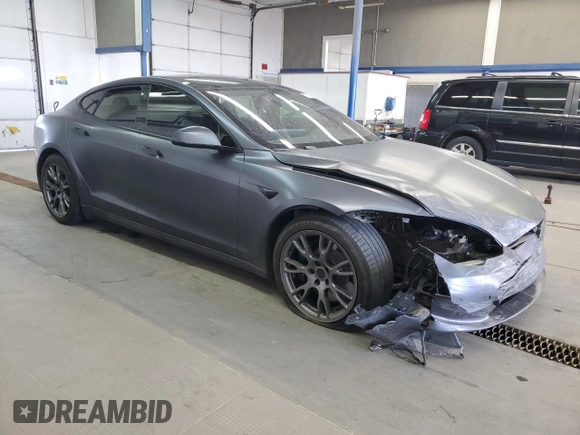 2022 Tesla Model S с VIN 5YJSA1E5XNF488415, выставлен на аукционе Copart как лот 57347565 с пробегом 18 662 миль миль и Списание • Salvage title. История ставок и продаж доступна на DreamBid. Изображение 4.