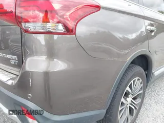2016 Mitsubishi Outlander GT z VIN JA4JZ4AXXGZ002867, wystawiony jako IAAI lot #42327299 z przebiegiem 85 538 mil mil oraz . Historia ofert i sprzedaży dostępna na DreamBid. Obrazek 20.