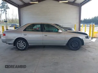 2001 Toyota Camry LE z VIN JT2BF28K110320365, wystawiony jako IAAI lot #41993343 z przebiegiem 211 458 mil mil oraz . Historia ofert i sprzedaży dostępna na DreamBid. Obrazek 13.