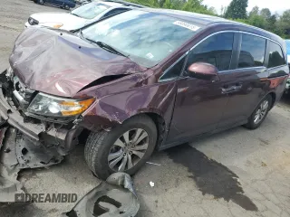 2014 Honda Odyssey EX-L with VIN 5FNRL5H60EB066979, listed as a Copart auction lot 58090615 with 149,561 mi miles and Salvage title. Bid and sale history available at DreamBid. Image 1.